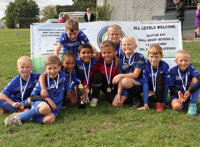Beacons U9 Whites Triumph at Ash & Strotten Tournament